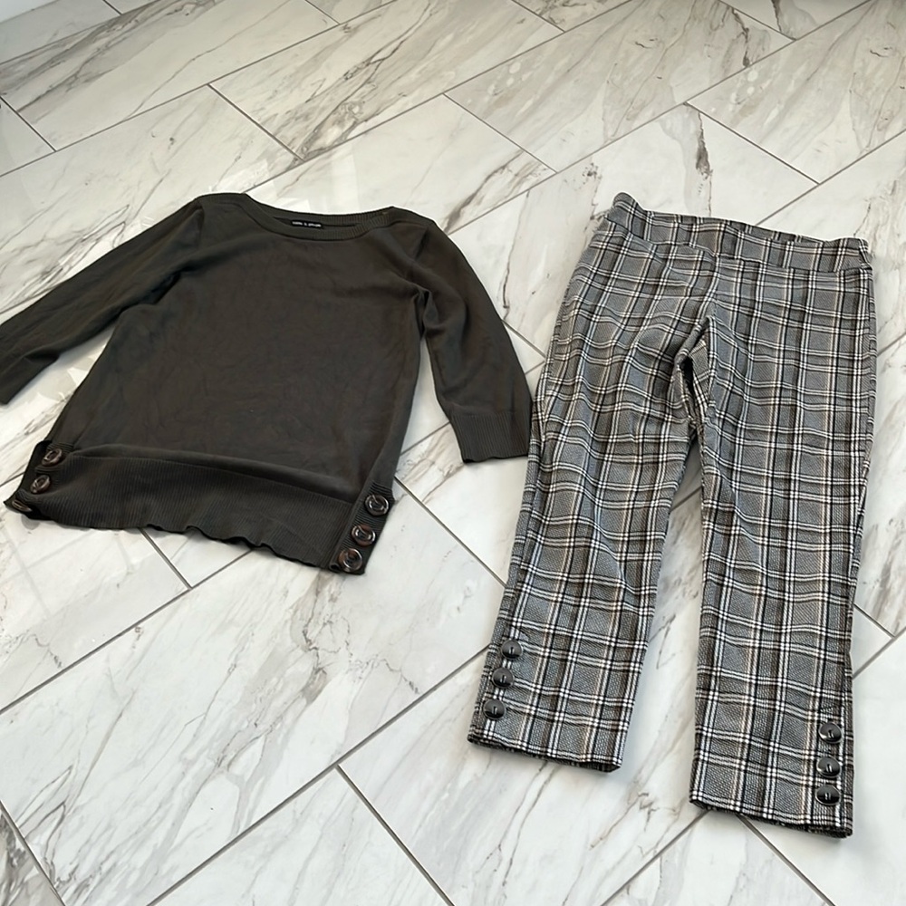 Sweater with ankle length pants.